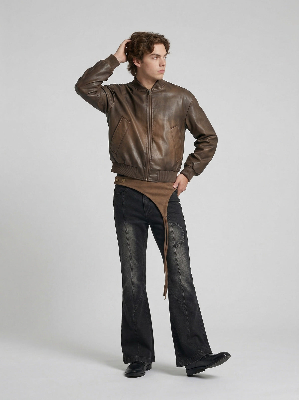 DAXUEN Washed black flared jeans with brown faux suede panel — model photo