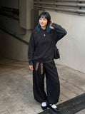 DAXUEN Washed black oversized hooded sweatshirt — model photo