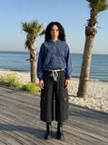 DAXUEN washed black polka dot cargo pants — model photo