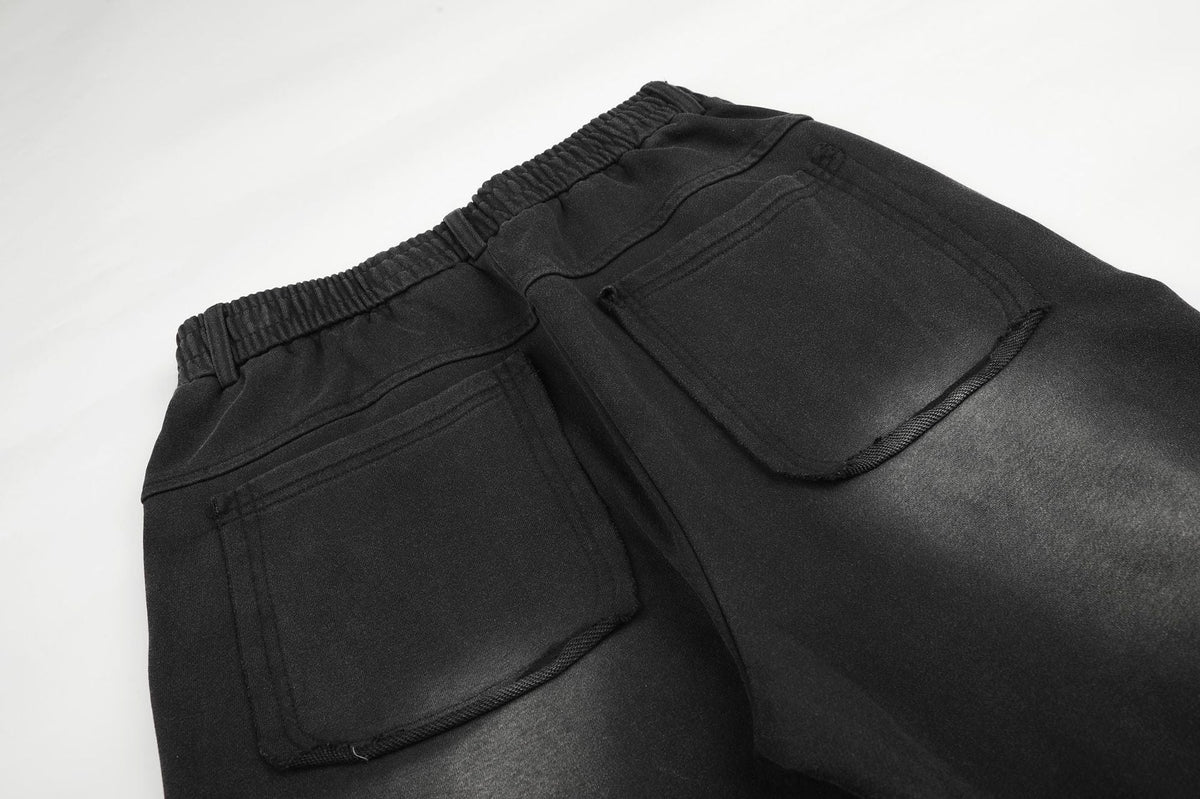 DAXUEN washed black wide-leg grommet trousers