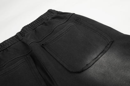DAXUEN washed black wide-leg grommet trousers