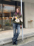 DAXUEN Flared blue denim jeans with distressed finish — model photo