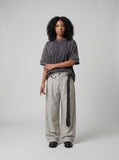 DAXUEN Oversized distressed short-sleeved t-shirt with paneling — model photo