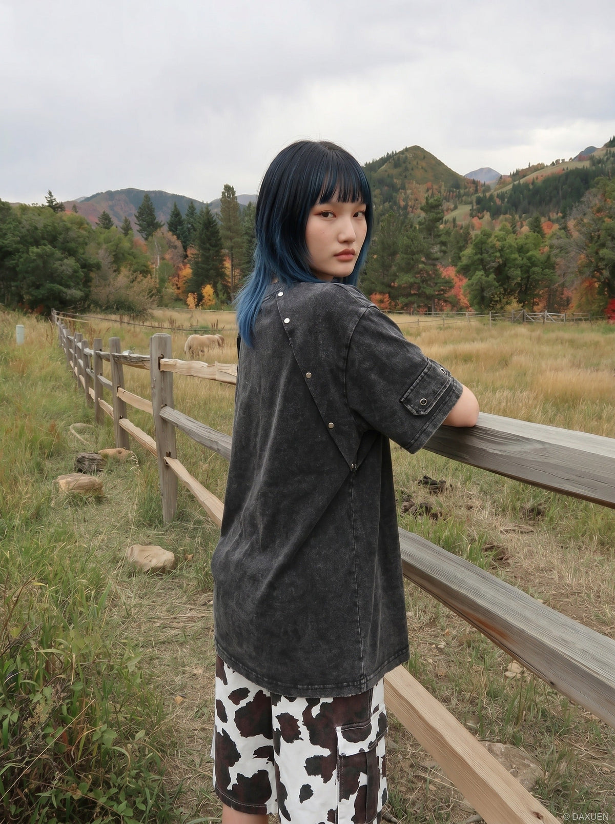 DAXUEN Oversized distressed short-sleeved t-shirt with paneling — model photo