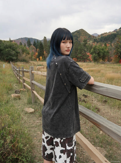 DAXUEN Oversized distressed short-sleeved t-shirt with paneling — model photo