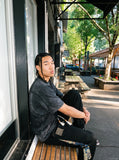 DAXUEN grey panelled relaxed-fit t-shirt — model photo