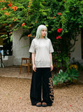 DAXUEN grey panelled relaxed-fit t-shirt — model photo