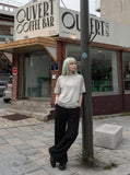 DAXUEN grey panelled relaxed-fit t-shirt — model photo