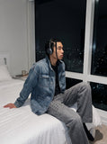 DAXUEN washed grey wide-leg grommet denim jeans — model photo