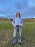 DAXUEN Wide-leg high-waisted jeans in medium blue denim — model photo