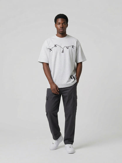 DAXUEN Oversized short-sleeve crew neck T-shirt with graphic — model photo