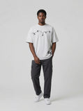 DAXUEN Oversized short-sleeve crew neck T-shirt with graphic — model photo