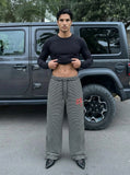 DAXUEN Black and white striped wide-leg track pants — model photo