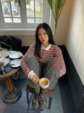 DAXUEN Black and white striped wide-leg track pants — model photo
