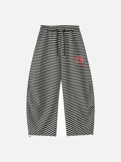 DAXUEN Black and white striped wide-leg track pants