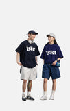 DAXUEN navy blue oversized wavy wordmark graphic T-shirt