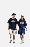 DAXUEN navy blue oversized wavy wordmark graphic T-shirt