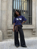 DAXUEN navy blue oversized wavy wordmark graphic T-shirt — model photo