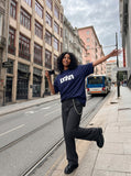 DAXUEN navy blue oversized wavy wordmark graphic T-shirt — model photo