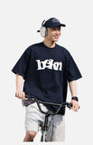 DAXUEN navy blue oversized wavy wordmark graphic T-shirt