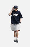 DAXUEN navy blue oversized wavy wordmark graphic T-shirt