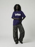 DAXUEN navy blue oversized wavy wordmark graphic T-shirt — model photo