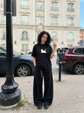 DAXUEN Oversized Pixel Animal Graphic Tee — model photo