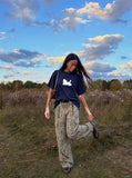 DAXUEN Oversized Pixel Animal Graphic Tee — model photo