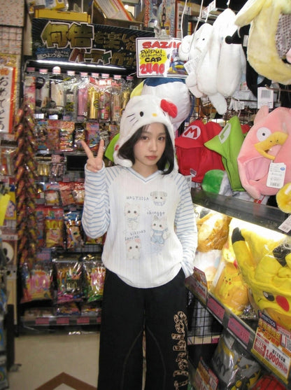 DAXUEN Whimsical cartoon animal V-neck long-sleeved top — model photo