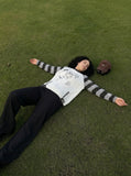 DAXUEN Long-sleeved knitted sweater with cat graphic — model photo