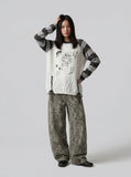 DAXUEN Long-sleeved knitted sweater with cat graphic — model photo