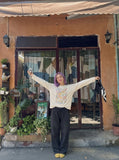 DAXUEN cream whimsical floral graphic long-sleeve top — model photo