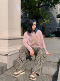 DAXUEN cream whimsical floral graphic long-sleeve top — model photo