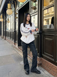DAXUEN white v-neck heart motif long-sleeve top — model photo