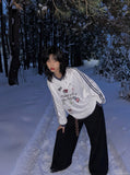 DAXUEN white v-neck heart motif long-sleeve top — model photo