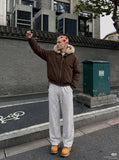 DAXUEN black and white checkered wide-leg pants — model photo