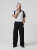 DAXUEN black wide-leg cargo pants with pockets — model photo