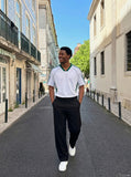 DAXUEN black wide-leg trousers with flap pockets — model photo