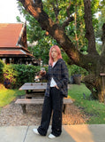 DAXUEN Wide-leg cargo pants in black and light grey — model photo