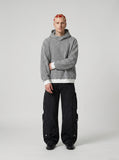 DAXUEN Wide-leg cargo pants in black and light grey — model photo