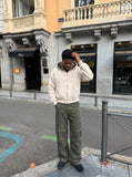 DAXUEN Wide-leg cargo pants with pockets and frayed seams — model photo