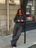 DAXUEN Wide-leg cargo pants with pockets and frayed seams — model photo