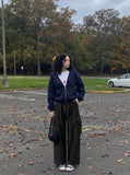 DAXUEN Wide-leg loose-fit cargo pants in dark grey and black — model photo