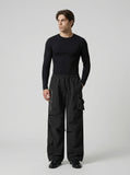 DAXUEN Unisex wide-leg cargo pants with utility pockets and embroidery — model photo