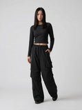 DAXUEN Unisex wide-leg cargo pants with utility pockets and embroidery — model photo