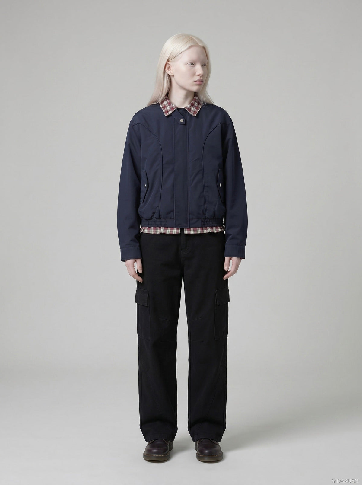 DAXUEN black wide-leg cargo pants with angled stitching — model photo