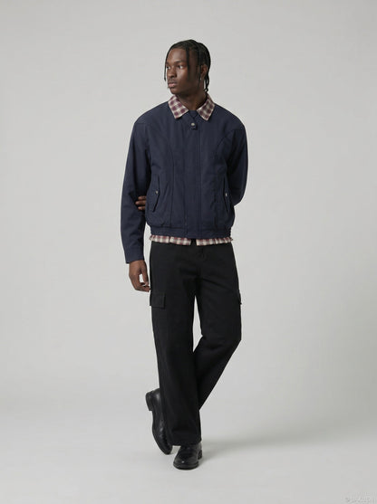 DAXUEN black wide-leg cargo pants with angled stitching — model photo