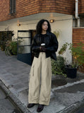 DAXUEN Wide-leg cargo pants in light beige/khaki color — model photo