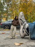 DAXUEN Wide-leg cargo pants in light beige/khaki color — model photo