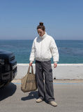 DAXUEN dark grey wide-leg cargo pants with woven strap detail — model photo